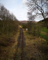 View of railroad tracks on field