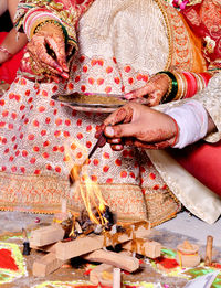 Midsection of woman holding ice cream