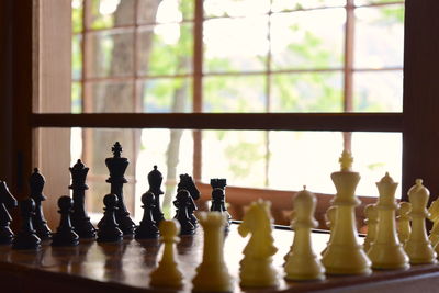 Close-up of chess pieces on board