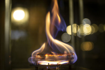 Close-up of burning candle