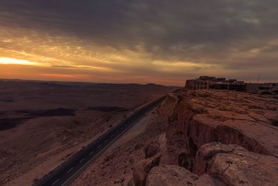 Scenic view of landscape against sky during sunset