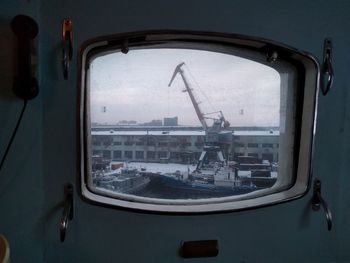 Reflection of buildings in mirror