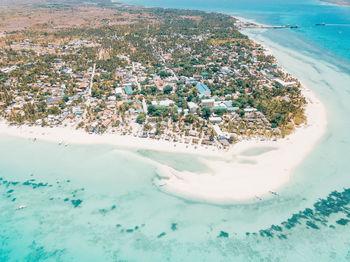 High angle view of city by sea during winter