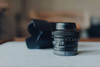 Close-up of camera on table