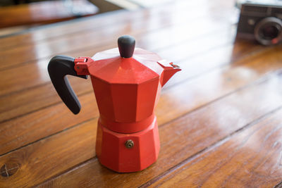 High angle view of red toy on table