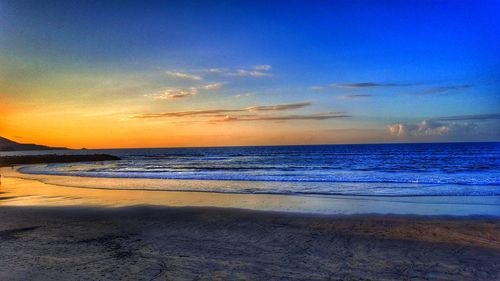 Scenic view of beach during sunset