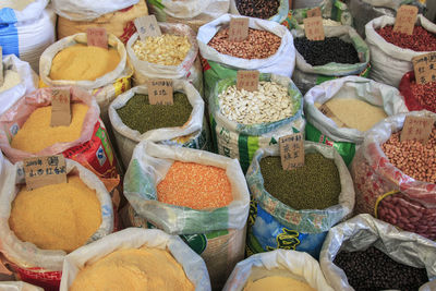 Full frame shot of raw food in sacks at market for sale