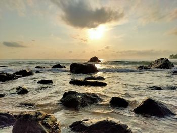 Scenic view of sea against sky during sunset