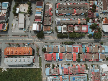 High angle view of train against buildings in city