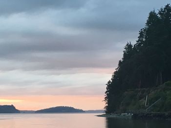 Scenic view of sea against sky at sunset