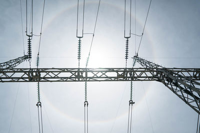 Low angle view of cables against clear sky