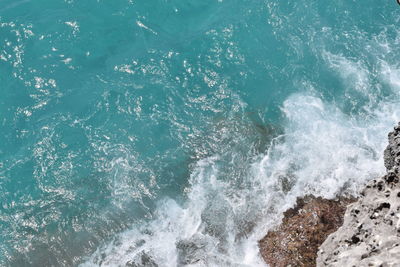 Waves splashing on rocks