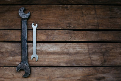 Directly above shot of work tools on wooden table