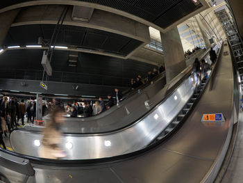 Group of people on escalator