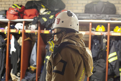 Female firefighter in locker