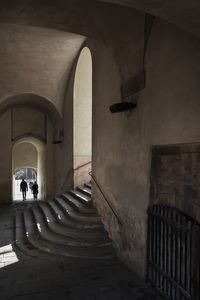 People in corridor of building