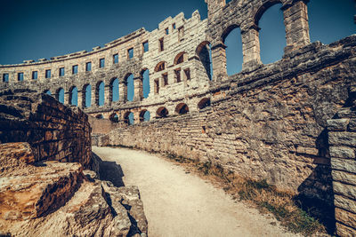 Old ruin building against sky