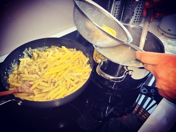 Close-up of hand holding ice cream