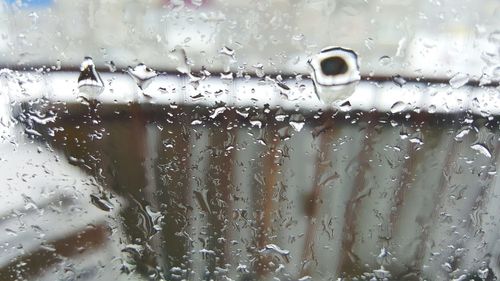Close-up of water drops on glass