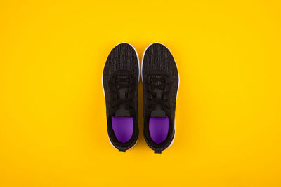 High angle view of shoes against black background