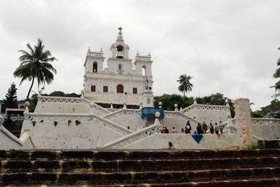 Group of people in front of building