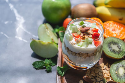 High angle view of fruits in glass on table