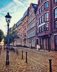 Street light on building in city