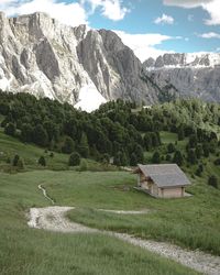 Scenic view of landscape and mountains against sky