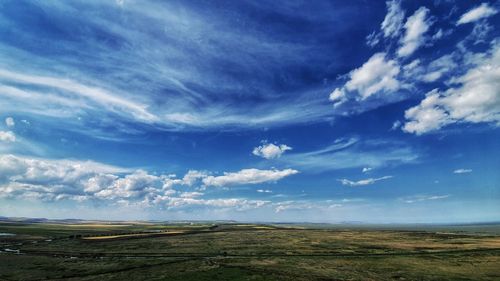 Scenic view of land against sky