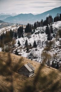 High angle view of huts on mountain during winter