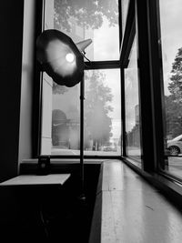 View of built structure through window