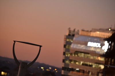 Close-up of city lit up at night