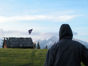 Kite flying on a meadow on a windy summer day