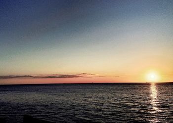 Scenic view of sea at sunset