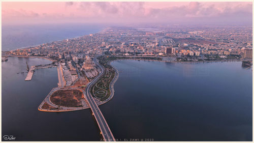 High angle view of bridge over river against buildings