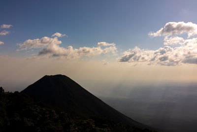 Scenic view of volcanic mountains against sky