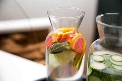 Jar with grapefruit and cucumber slices