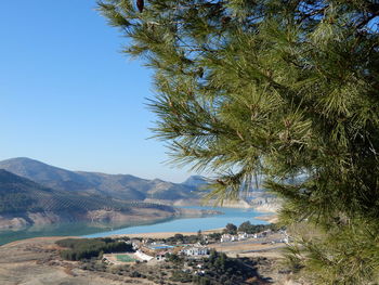 Scenic view of sea against clear blue sky