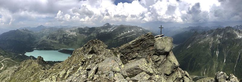 Panoramic view of rocks and mountains against sky