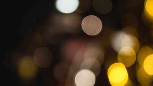 Defocused image of illuminated lights at night