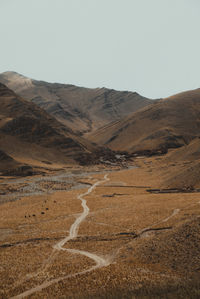 Road through the mountains and clouds