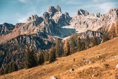 Scenic view of landscape and mountains against sky