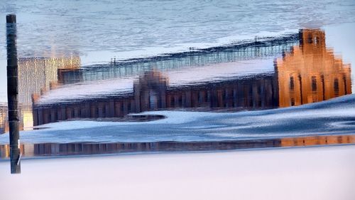 Reflection of snow on sea during winter