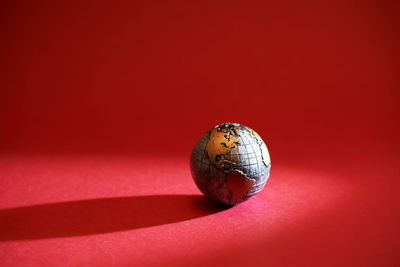 Close-up of drink against red background