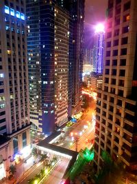 High angle view of illuminated buildings at night