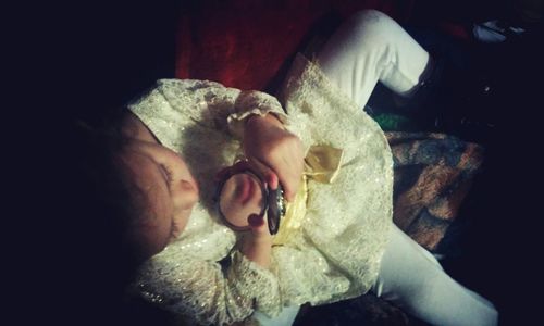 Portrait of a baby girl sitting on bench