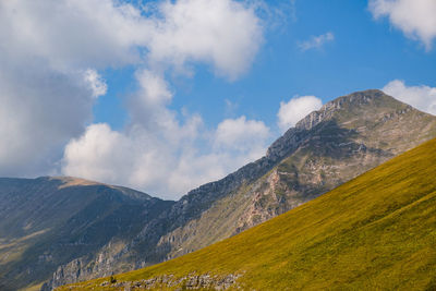 Scenic view of mountains against sky in montefortino, marche italy