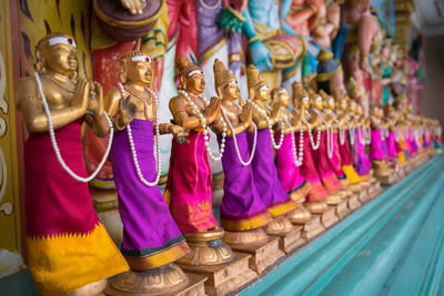 Close-up of statues in sri maha mariamman temple dhevasthanam