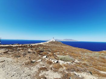 Scenic view of sea against clear blue sky