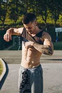 Young man standing outdoors